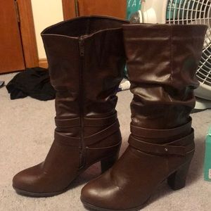 Worn one high heeled boots